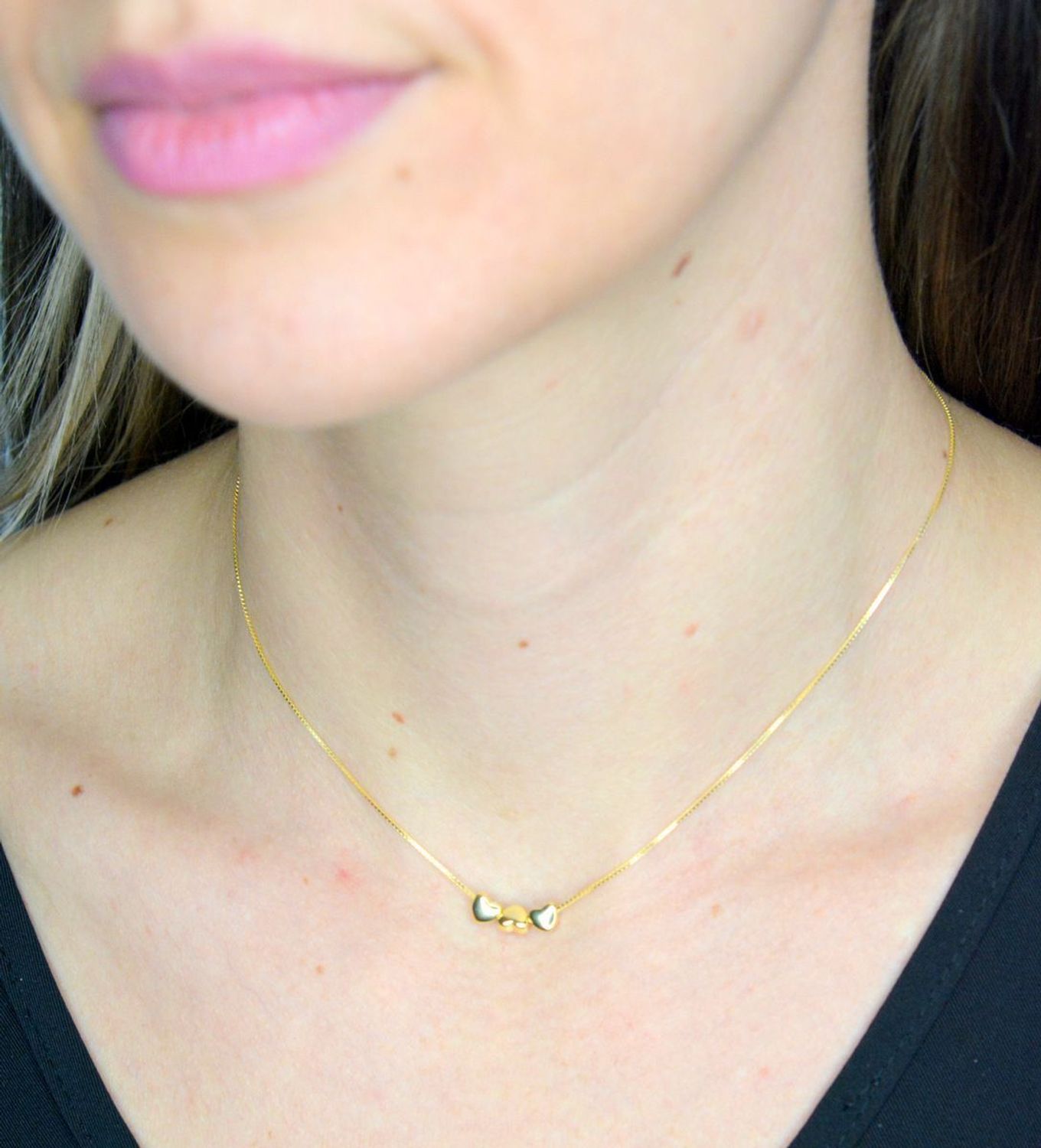 Naszyjnik damski srebrny pozłacany z trzema serduszkami Armonica Nomination 241305 006.png